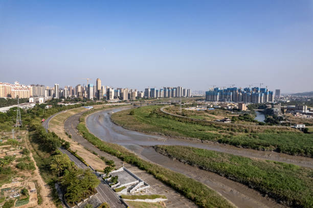 istock A city building by a river 2193090050