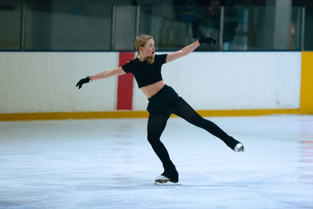 istock Figure skating girl training on ice arena. 2193091176