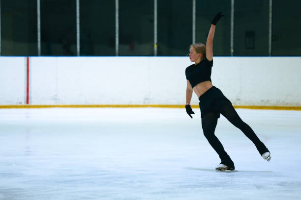 istock Figure skating girl training on ice arena. 2193091187