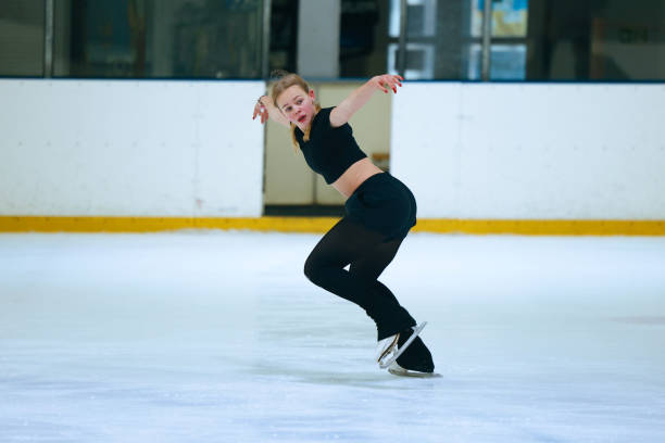 istock Figure skating girl training on ice arena. 2193091279