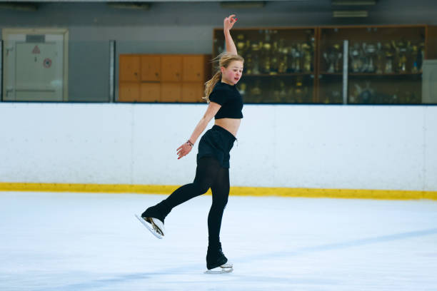 istock Figure skating girl training on ice arena. 2193091280