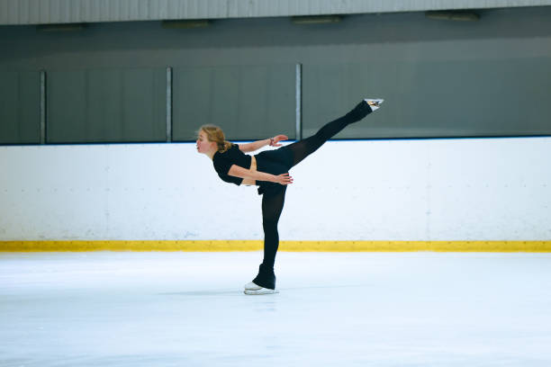 istock Figure skating girl training on ice arena. 2193091305