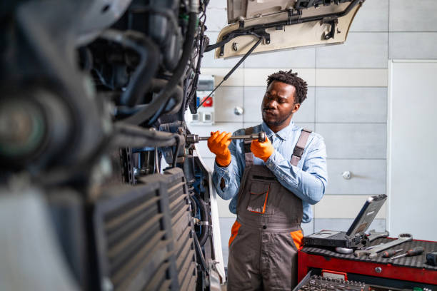 istock Experienced mechanic working on truck repair. 2193105375