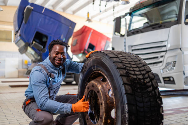 istock Truck tire repair and replacement. 2193105523