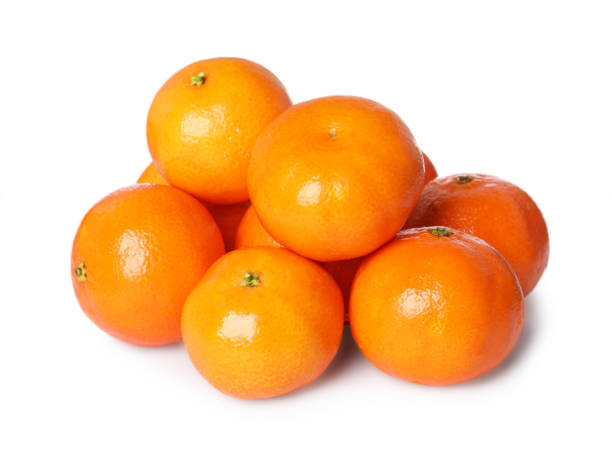 istock Many fresh ripe tangerines isolated on white 2193109114