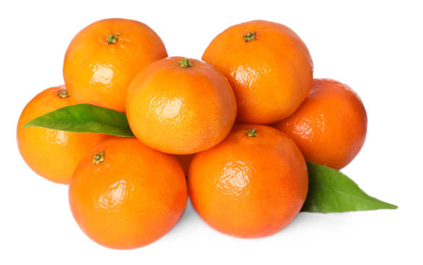 istock Fresh ripe tangerines and green leaves isolated on white 2193109141