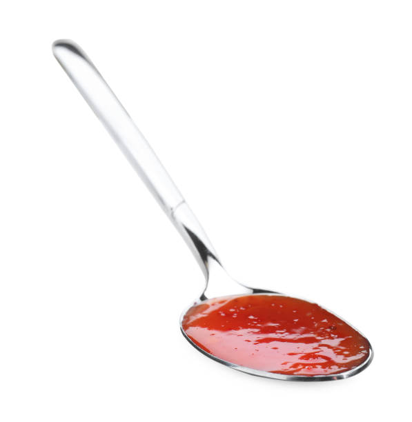 istock Spicy chili sauce in spoon isolated on white 2193109520