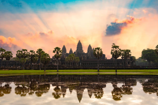 istock Angkor Wat, ancient temple ruins in Cambodia on sunrise 2193110159