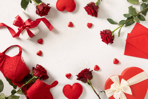 istock Valentine's day frame. Red lace bustier underwear, candy sweets and red roses 2193115565
