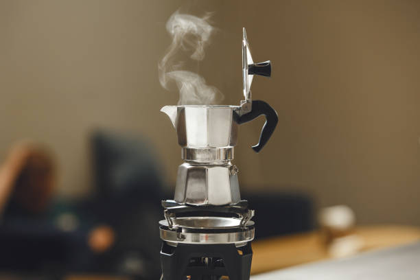 istock Boiling Moka Pot on the Stove, Preparing Rich Espresso in an Inviting Kitchen Setting 2193117245