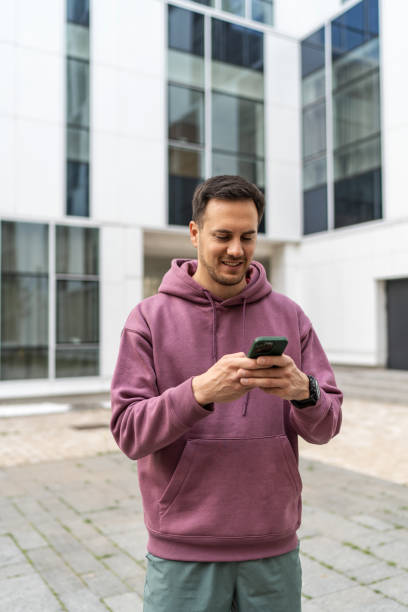 istock Handsome man checking fitness activity on phone after training 2193117752