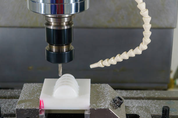 istock The nylon material parts cutting the by CNC milling machine with solid ball nose end mill tool. 2193118149