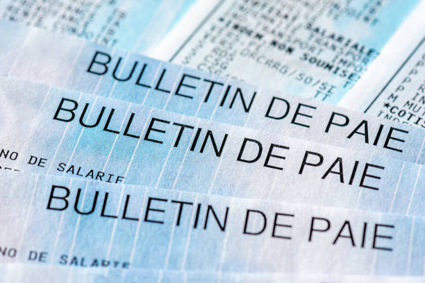 istock Close-up of several French pay slips ('bulletin de paie') 2193118610
