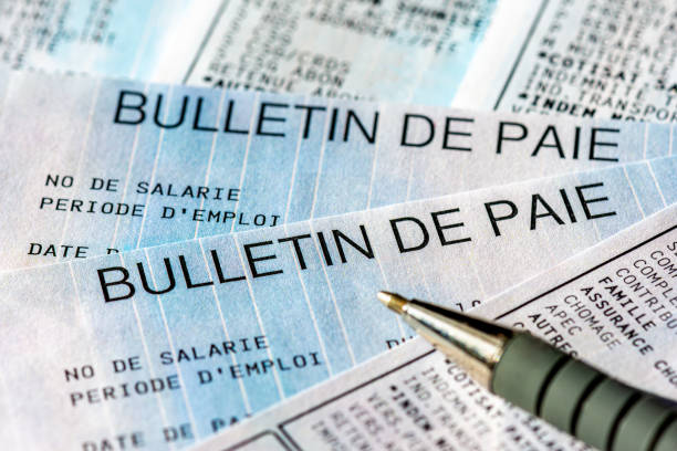 istock Close-up of several French pay slips ('bulletin de paie') 2193118611