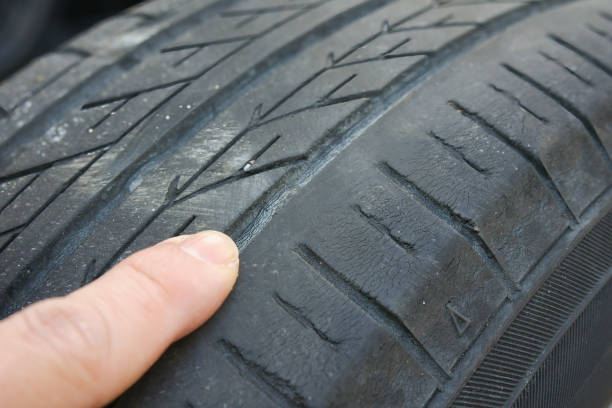 istock Check by pointing at the triangular mark on the tire slip sign 2193118886