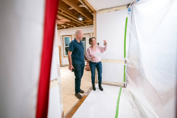 istock Couple supervising home renovation progress 2193122010