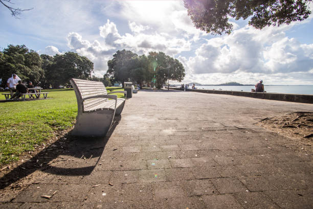 istock chairs sitting on a wood dock facing a lake 2193123436