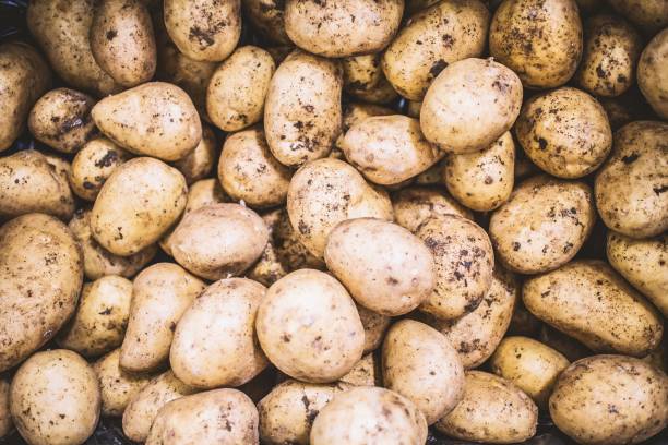 Fresh raw potatoes in a bag