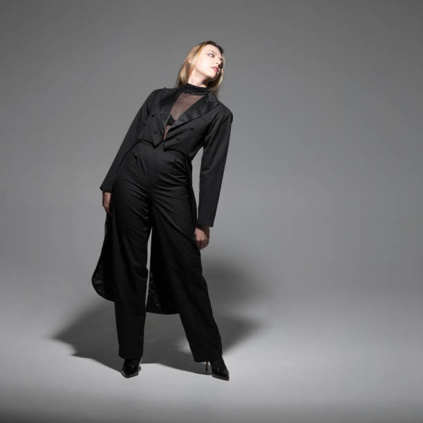 istock Beautiful woman with tailcoat studio portrait 2193125984