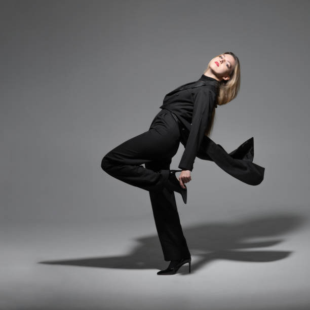istock Beautiful woman with tailcoat studio portrait 2193125985