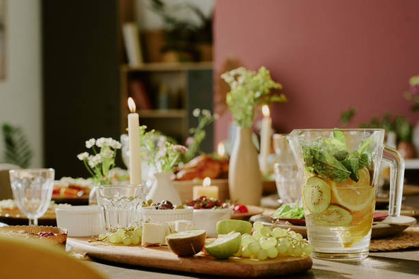 istock Fresh Fruits and Jar of Lemonade on Table 2193126130