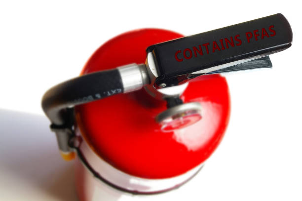 Fire extinguisher from the top, on white with Contains PFAS text
