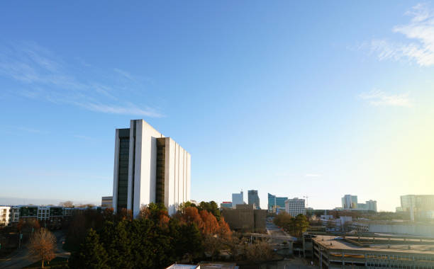 istock Raleigh North Carolina skyline at sunset, looking South with lingering Fall foliage 2193127340