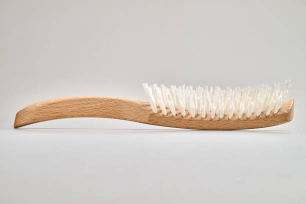 istock Wooden Hair brush with handle isolated on white bakground 2193127412