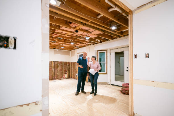 istock Couple supervising home renovation progress 2193127600