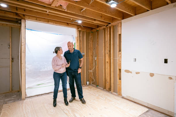 istock Couple supervising home renovation progress 2193131231