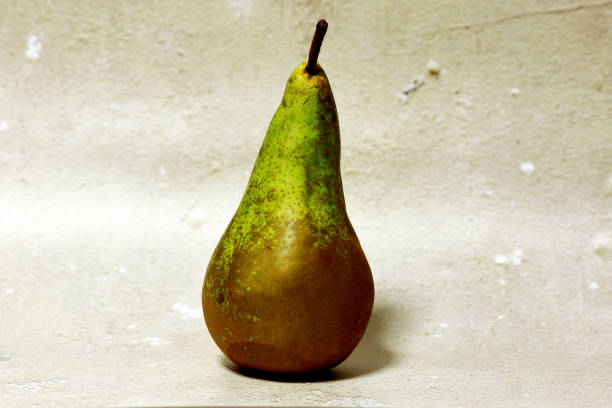 istock mouth-watering tasty pear in the studio 2193132673