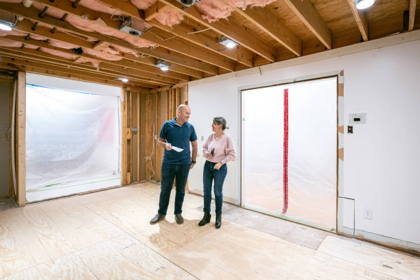 istock Couple supervising home renovation progress 2193133093
