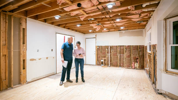 istock Couple supervising home renovation progress 2193133178