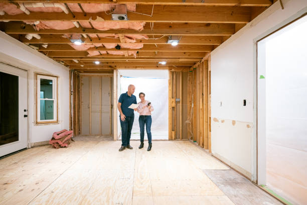 istock Couple supervising home renovation progress 2193134040