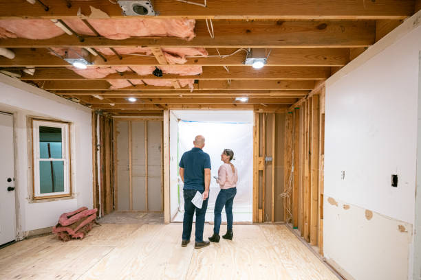 istock Couple supervising home renovation progress 2193134190