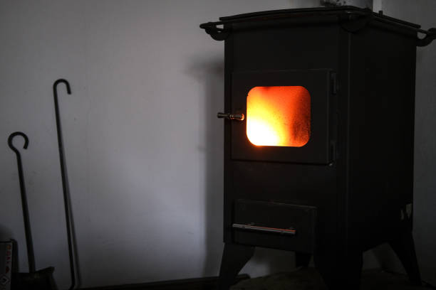 Glowing embers in the fireplace.