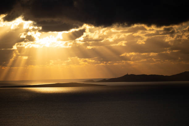 istock Epic Sunset over the sea with volumetric lighting 2193137089