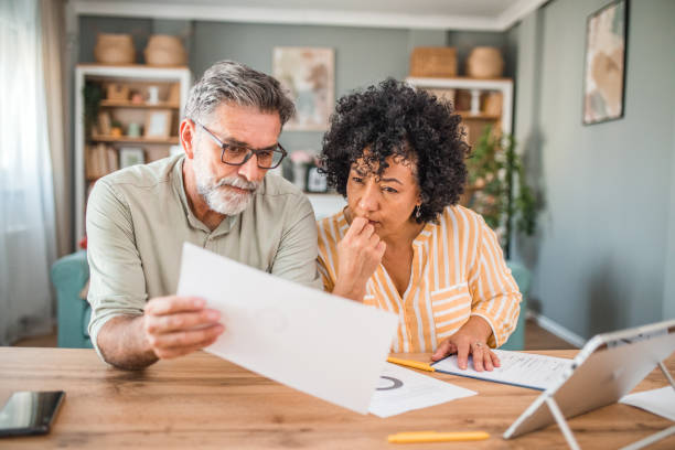 istock A diverse married couple working on their monthly domestic finances 2193140463