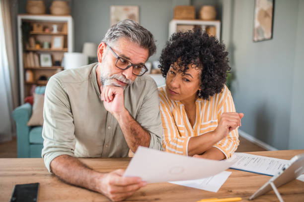 istock A middle-aged loving couple working on their monthly domestic finances 2193141175