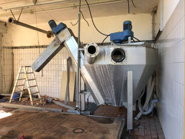 istock Old machine for washing sand in a sewage treatment plant before expansion 2193141371