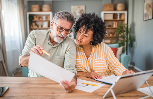 istock A multi-ethnic loving couple working on their monthly domestic finances 2193141987