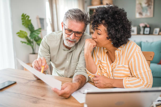 istock A diverse loving couple working on their monthly domestic finances 2193143764
