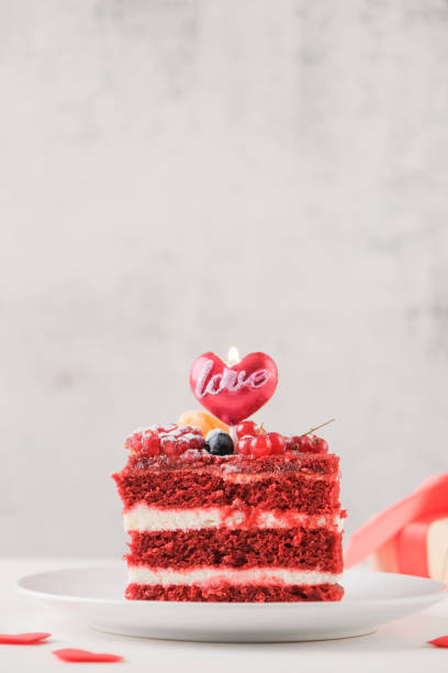 istock red velvet cake with fruit for valentines day on white table setting, copy space 2193146374
