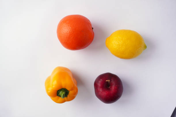 istock Four colorful fruits and vegetables on white background 2193146400