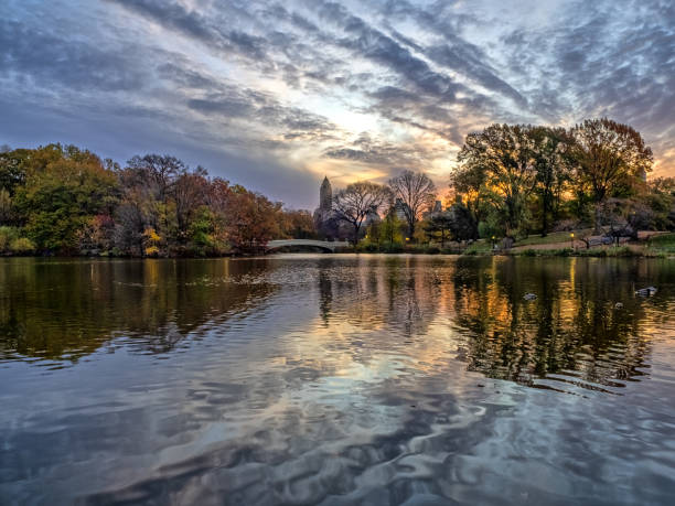istock Bow bridge in late autumn at lake 2193150950