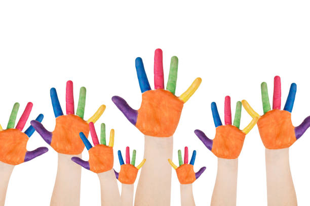 children's hands painted on a white background with clipping path. Children's smiling colorful hands raised up.