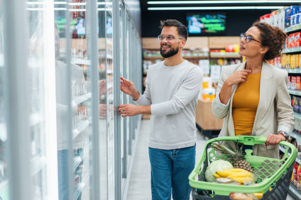 istock Couple shopping in supermarket. 2193165329