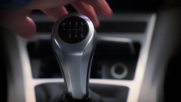 istock Driver changing gear with manual transmission gear stick 2193166358