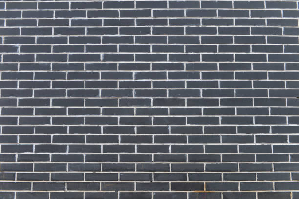 istock Brick and stone walls, red leaves 2193170942
