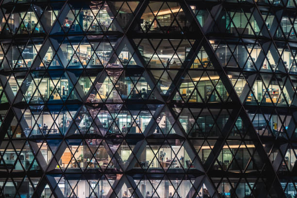 istock Illuminated office buildings in London 2193175076